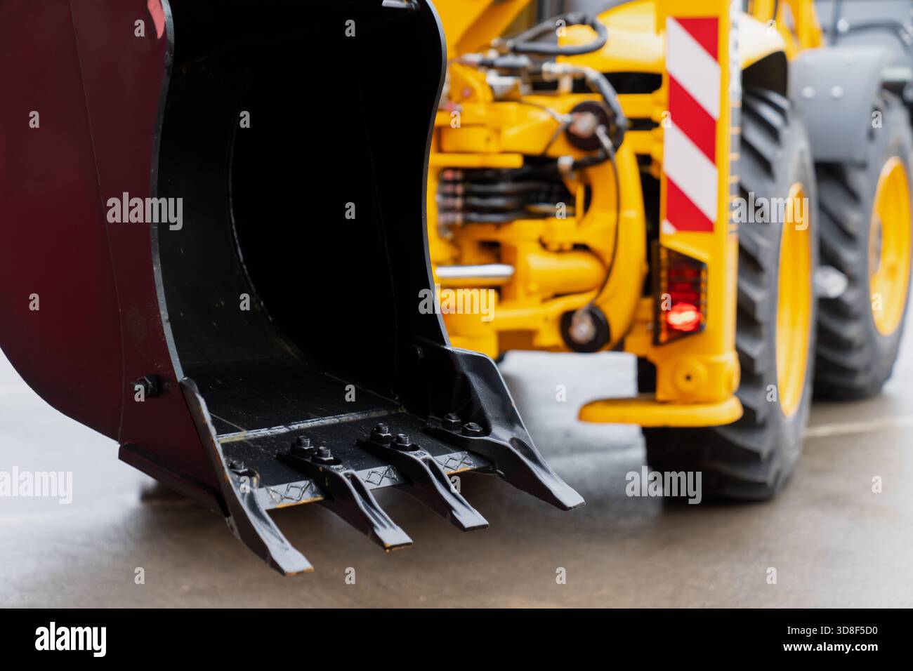 High-resolution image capturing the steel bucket and tooth assembly of ...