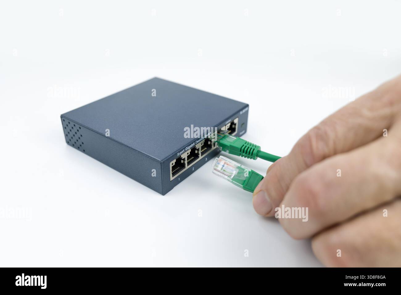 Ethernet switch box port on a white Stock Photo