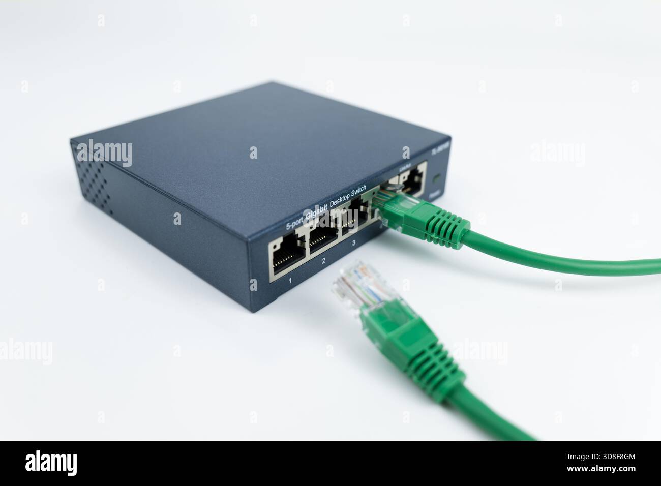 Ethernet switch box port on a white Stock Photo