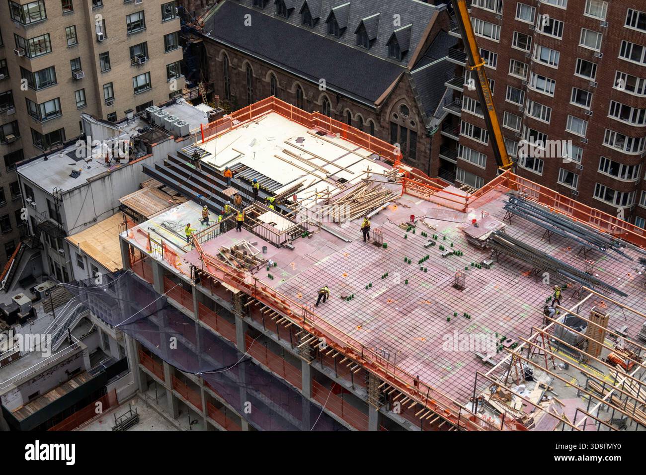Construction of a residential apartment building features building ...