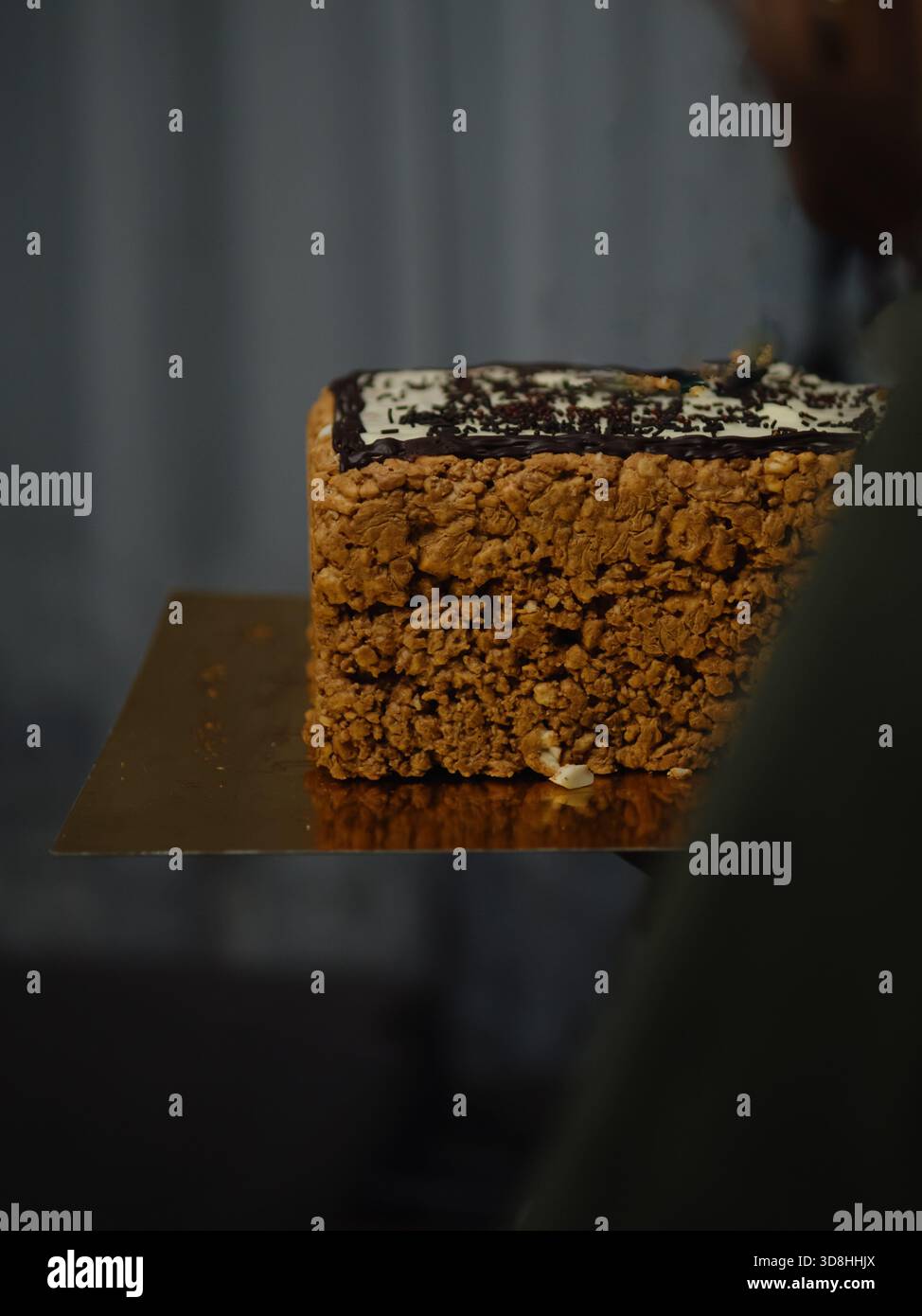 Rectangular Anthill Cake on Gold Cake Board, Low-Light Close-Up Stock Photo