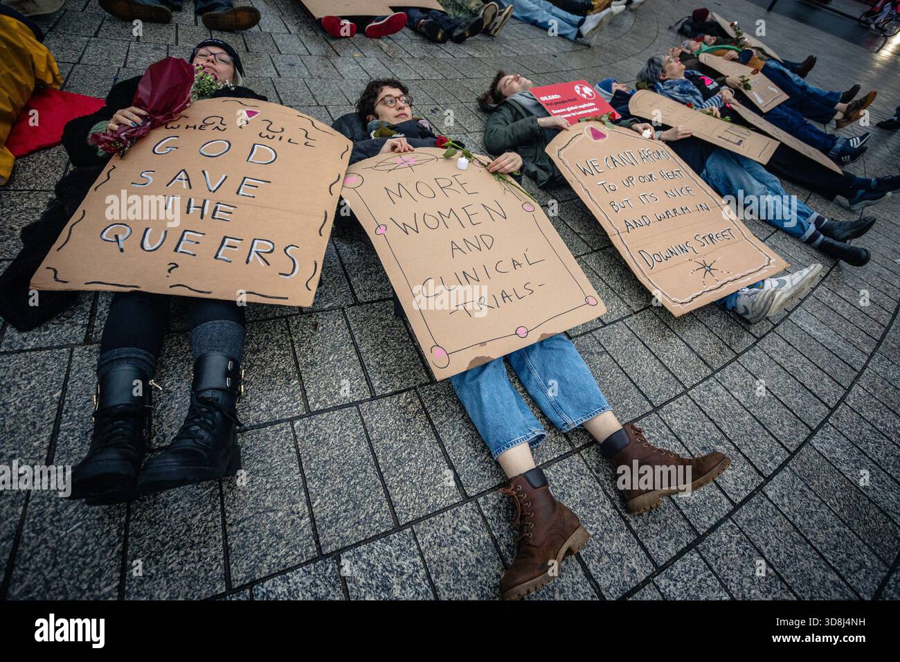 Activists from ACT UP London stage a mass World AIDS Day die-in by ...