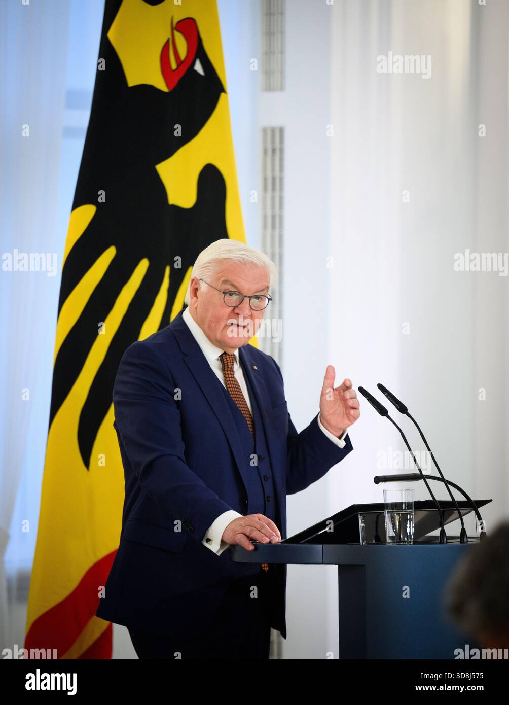 Berlin, Germany. 01st Dec, 2025. Federal President Frank-Walter Steinmeier speaks at the beginning of the award ceremony for the Order of Merit of the Federal Republic of Germany at Bellevue Palace. Under the motto 'Germany in the World', the Federal President is today awarding the Order of Merit to eleven women and nine men for their outstanding commitment on International Volunteer Day on December 5. Credit: Bernd von Jutrczenka/dpa/Alamy Live News Stock Photo