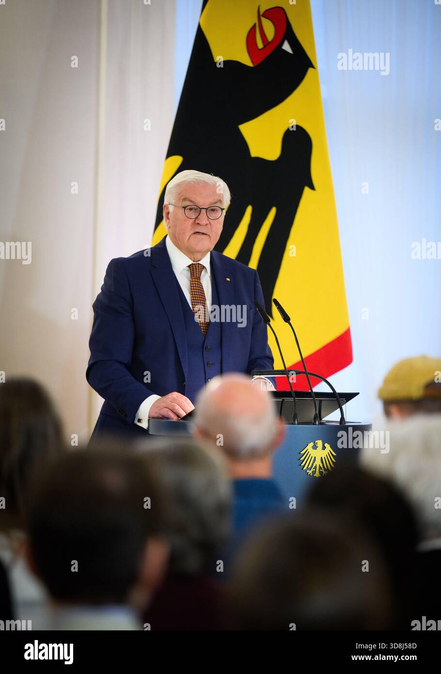 Berlin, Germany. 01st Dec, 2025. Federal President Frank-Walter Steinmeier speaks at the beginning of the award ceremony for the Order of Merit of the Federal Republic of Germany at Bellevue Palace. Under the motto 'Germany in the World', the Federal President is today awarding the Order of Merit to eleven women and nine men for their outstanding commitment on International Volunteer Day on December 5. Credit: Bernd von Jutrczenka/dpa/Alamy Live News Stock Photo
