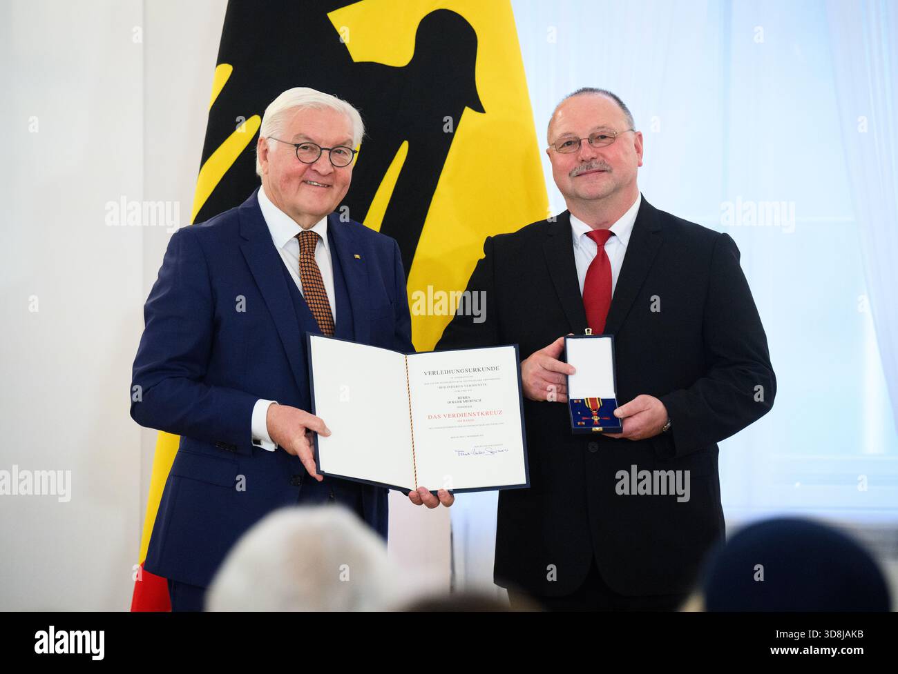 Berlin, Germany. 01st Dec, 2025. Federal President Frank-Walter Steinmeier awards Holger Miertsch from Heideblick (Brandenburg) the Order of Merit of the Federal Republic of Germany at Bellevue Palace. Under the motto 'Germany in the World', the Federal President is today awarding the Order of Merit to 11 women and 9 men for their outstanding commitment on International Volunteer Day on December 5. Credit: Bernd von Jutrczenka/dpa/Alamy Live News Stock Photo
