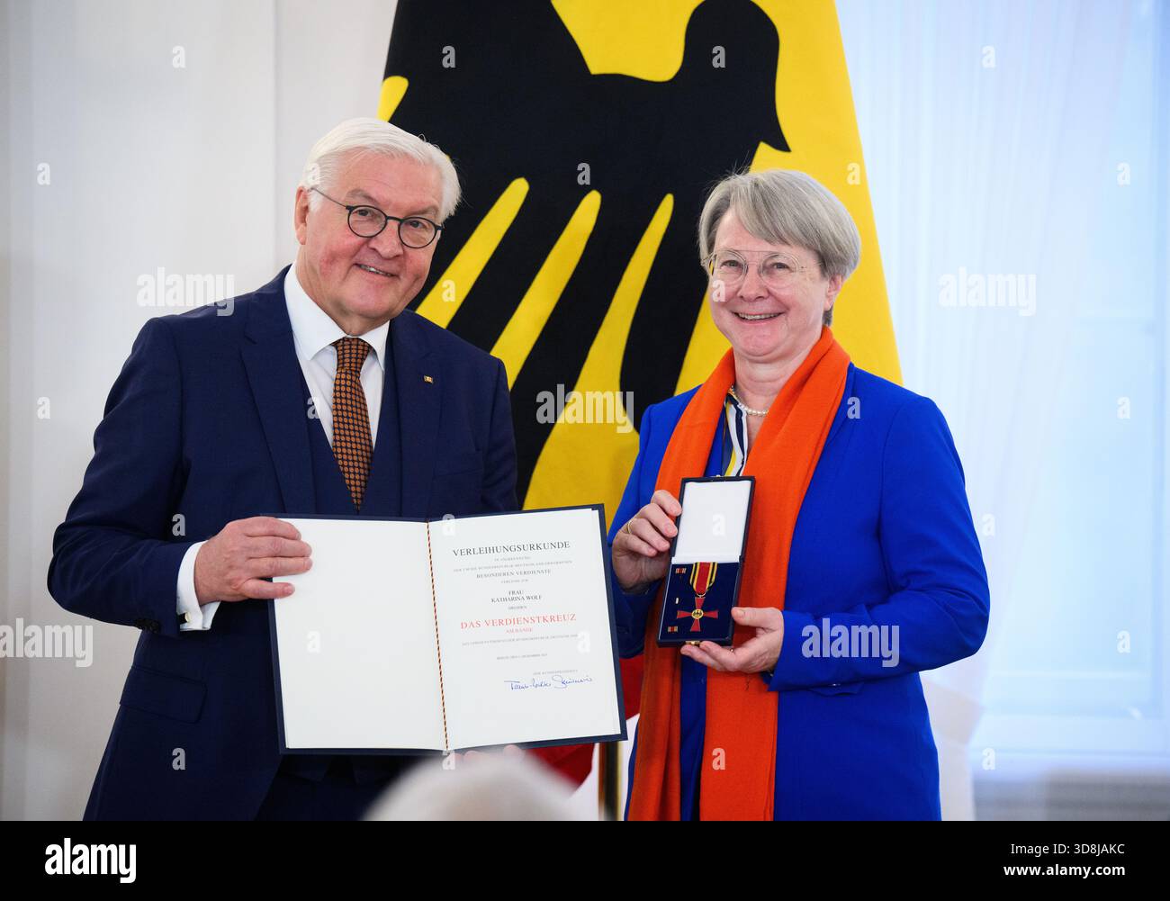 Berlin, Germany. 01st Dec, 2025. Federal President Frank-Walter Steinmeier awards Katharina Wolf from Dresden (Saxony) the Order of Merit of the Federal Republic of Germany at Bellevue Palace. Under the motto 'Germany in the World', the Federal President is today awarding the Order of Merit to 11 women and 9 men for their outstanding commitment on International Volunteer Day on December 5. Credit: Bernd von Jutrczenka/dpa/Alamy Live News Stock Photo