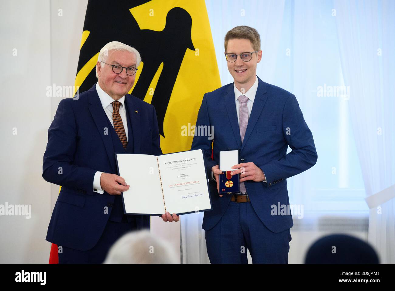Berlin, Germany. 01st Dec, 2025. Federal President Frank-Walter Steinmeier awards Daniel Kehne from Cologne (North Rhine-Westphalia) the Order of Merit of the Federal Republic of Germany at Bellevue Palace. Under the motto 'Germany in the World', the Federal President is today awarding the Order of Merit to 11 women and 9 men for their outstanding commitment on International Volunteer Day on December 5. Credit: Bernd von Jutrczenka/dpa/Alamy Live News Stock Photo