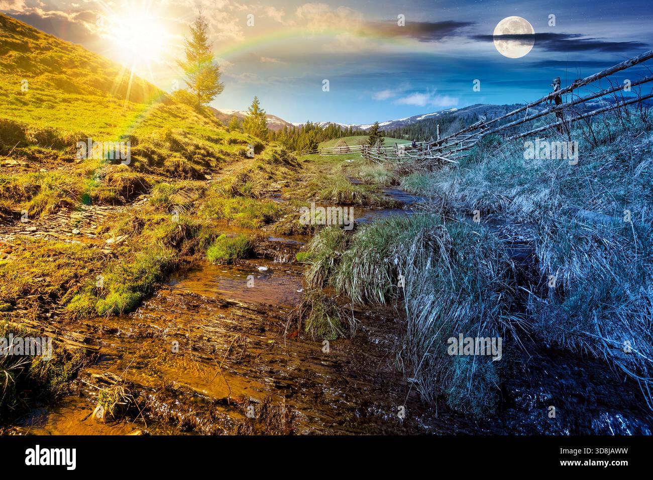 rural scene of mountain landscape on spring equinox. day and night time change concept. green countryside with forested hills with sun and moon at twi Stock Photo