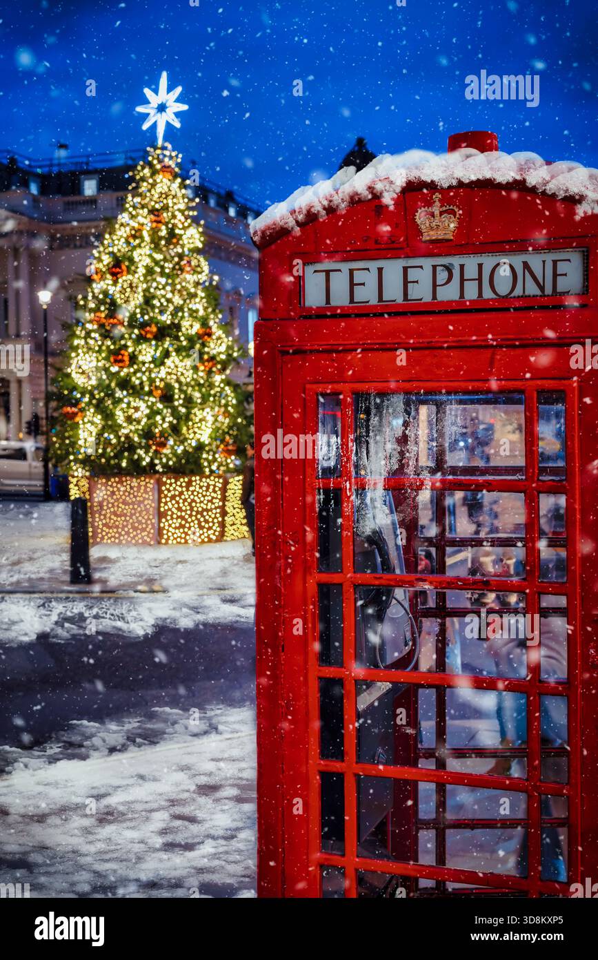 Winter Telephone Christmas and winter in London scene with a classic, red telephone ...