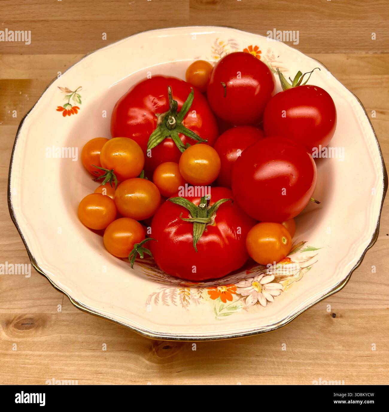 A Bowl of lovely red tomatoes Stock Photo