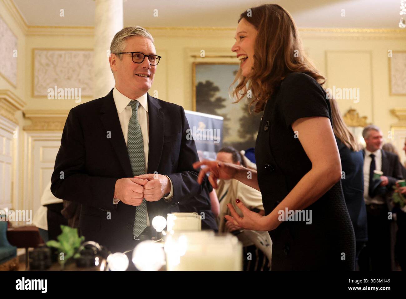 Prime Minister Sir Keir Starmer and his wife Lady Victoria Starmer, hosts a Christmas market-style showcase for small firms and community champions in number 10 Downing Street, London. Picture date: Monday December 1, 2025. Stock Photo