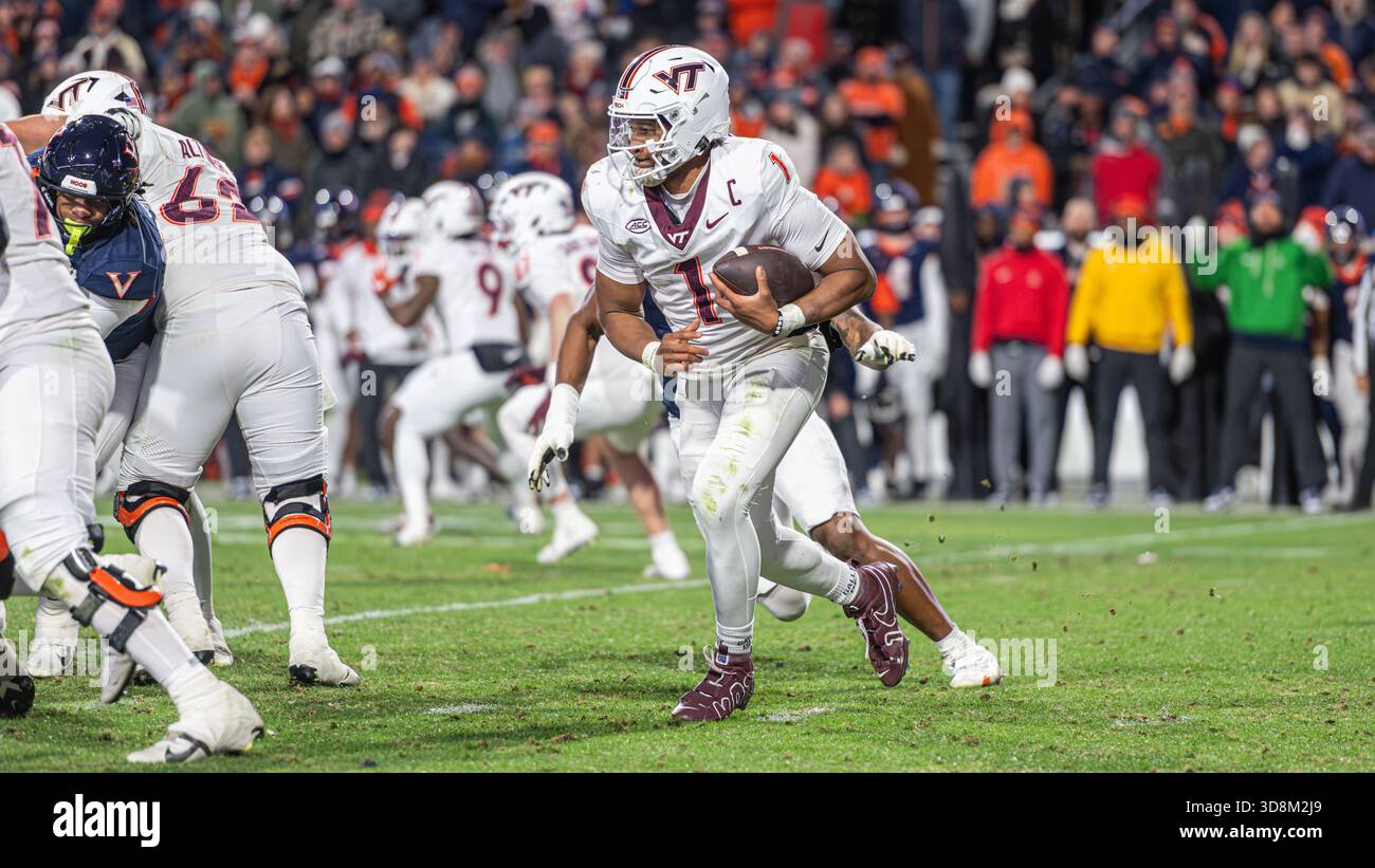 Virginia Tech Hokies quarterback Kyron Drones (1) runs the ball against ...