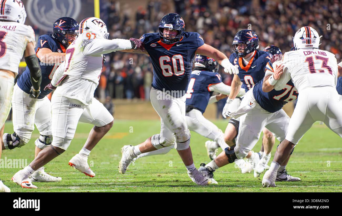 Virginia offensive lineman Drake Metcalf (60) blocks Virginia Tech ...