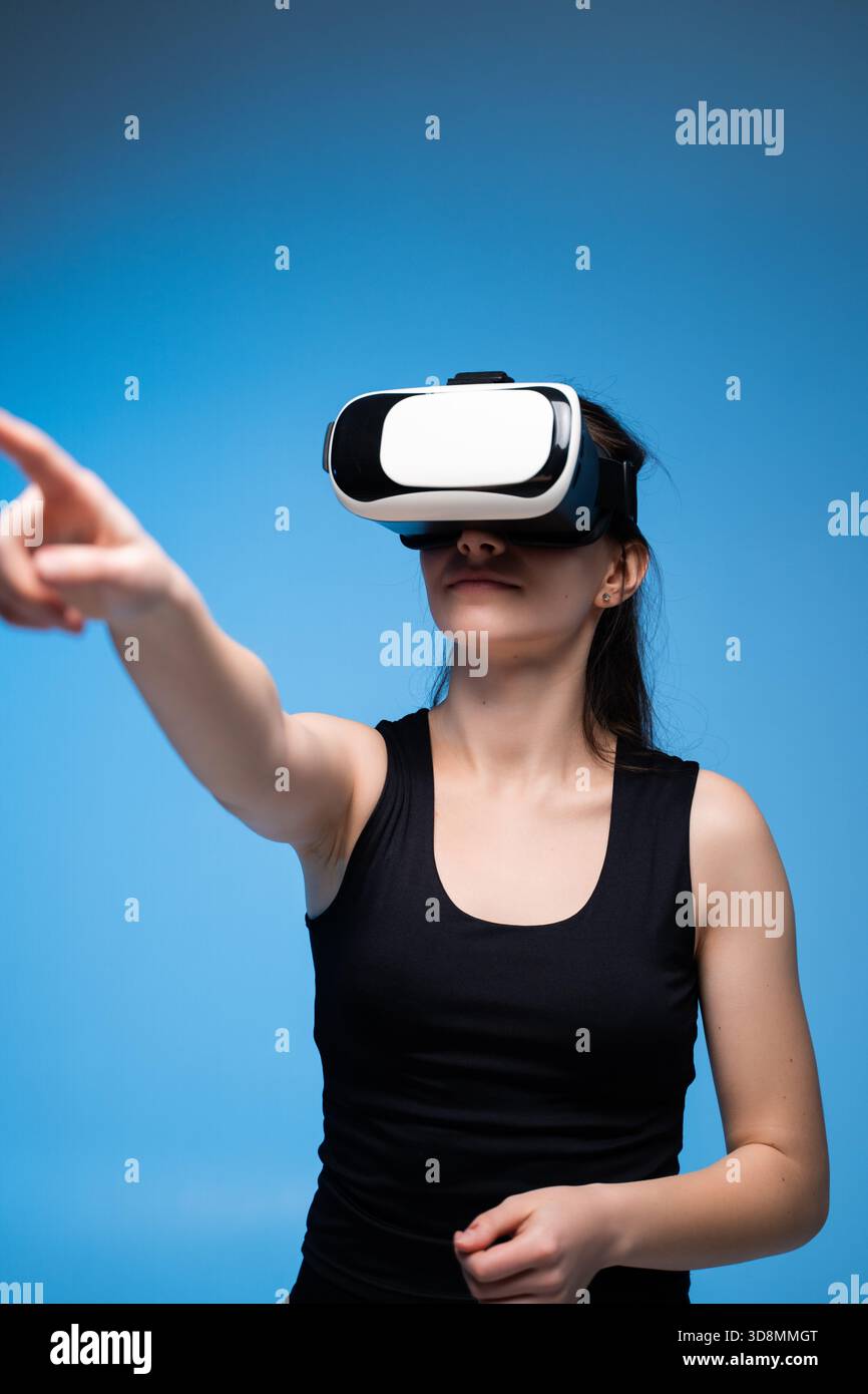 Engineer Navigating 3D Architectural Model Using VR Controls for Precise Spatial Examination Stock Photo