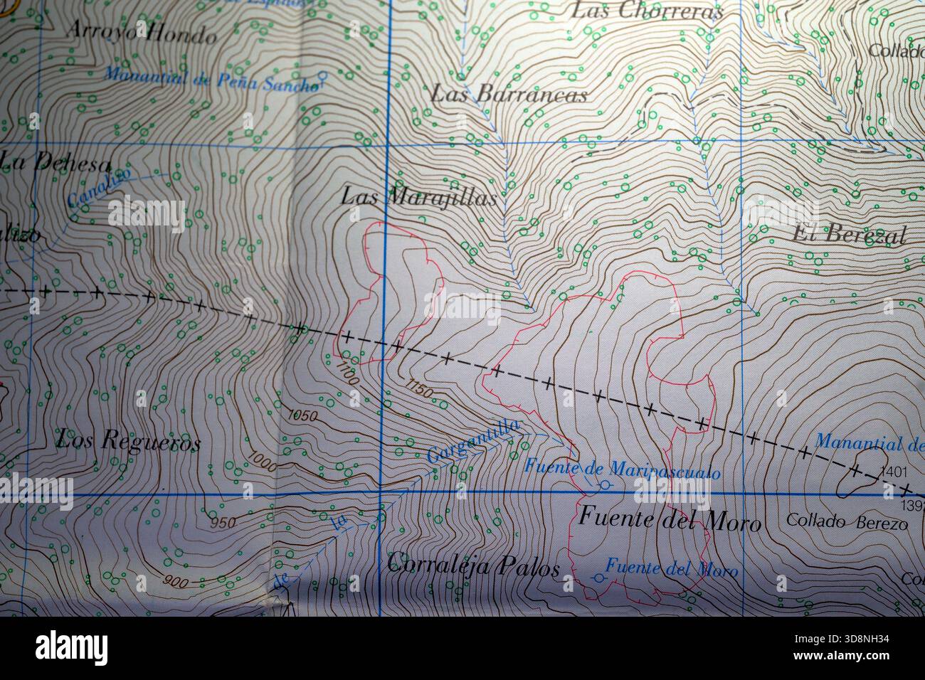 Close up view of a detailed paper topographic map showing contour lines ...