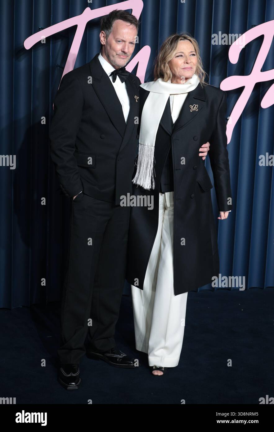 London, UK. 01st Dec, 2025. Russell Thomas and Kim Cattrall attend The ...