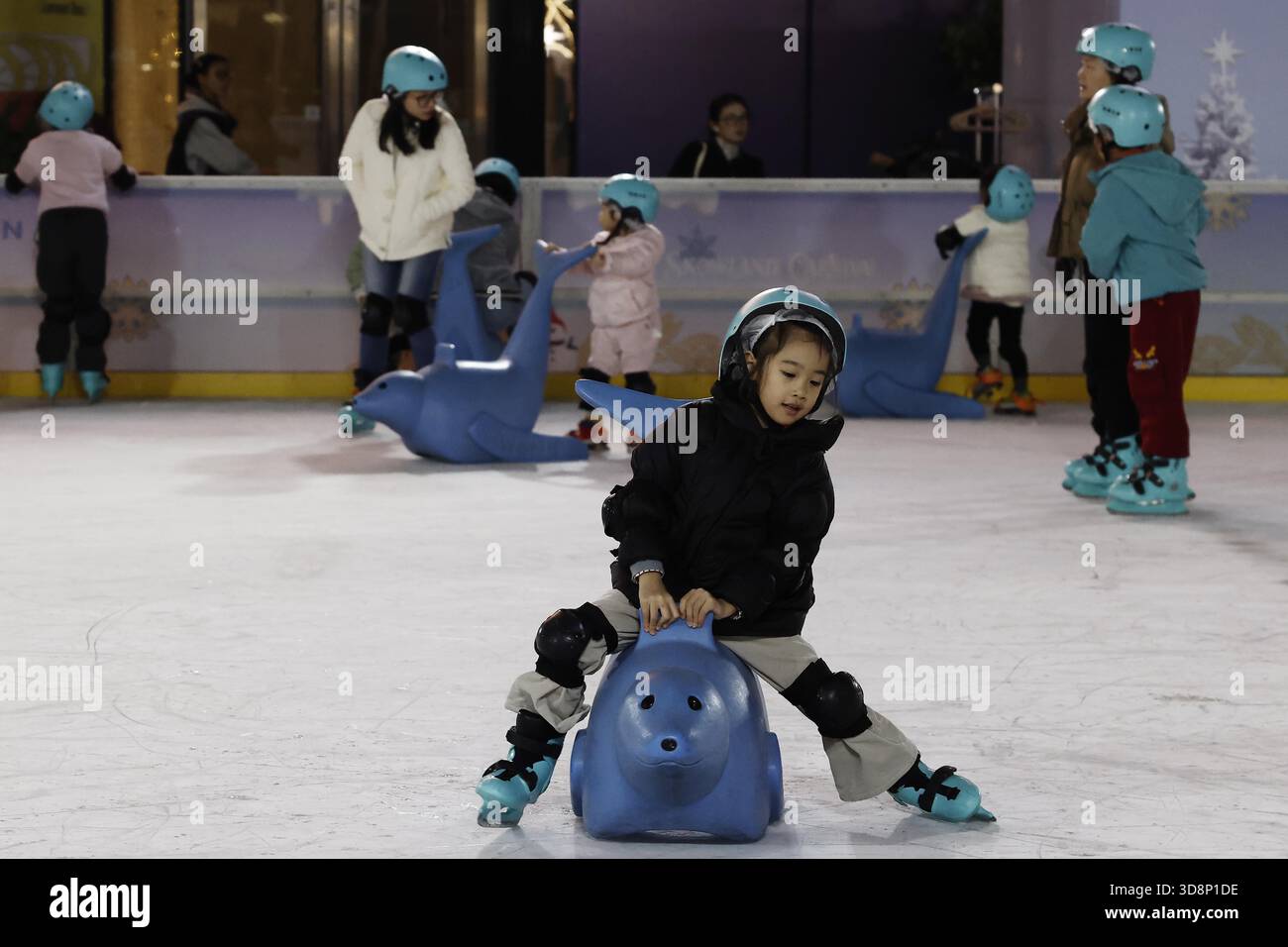 **CHINESE MAINLAND, HONG KONG, MACAU AND TAIWAN OUT** Children play at ...