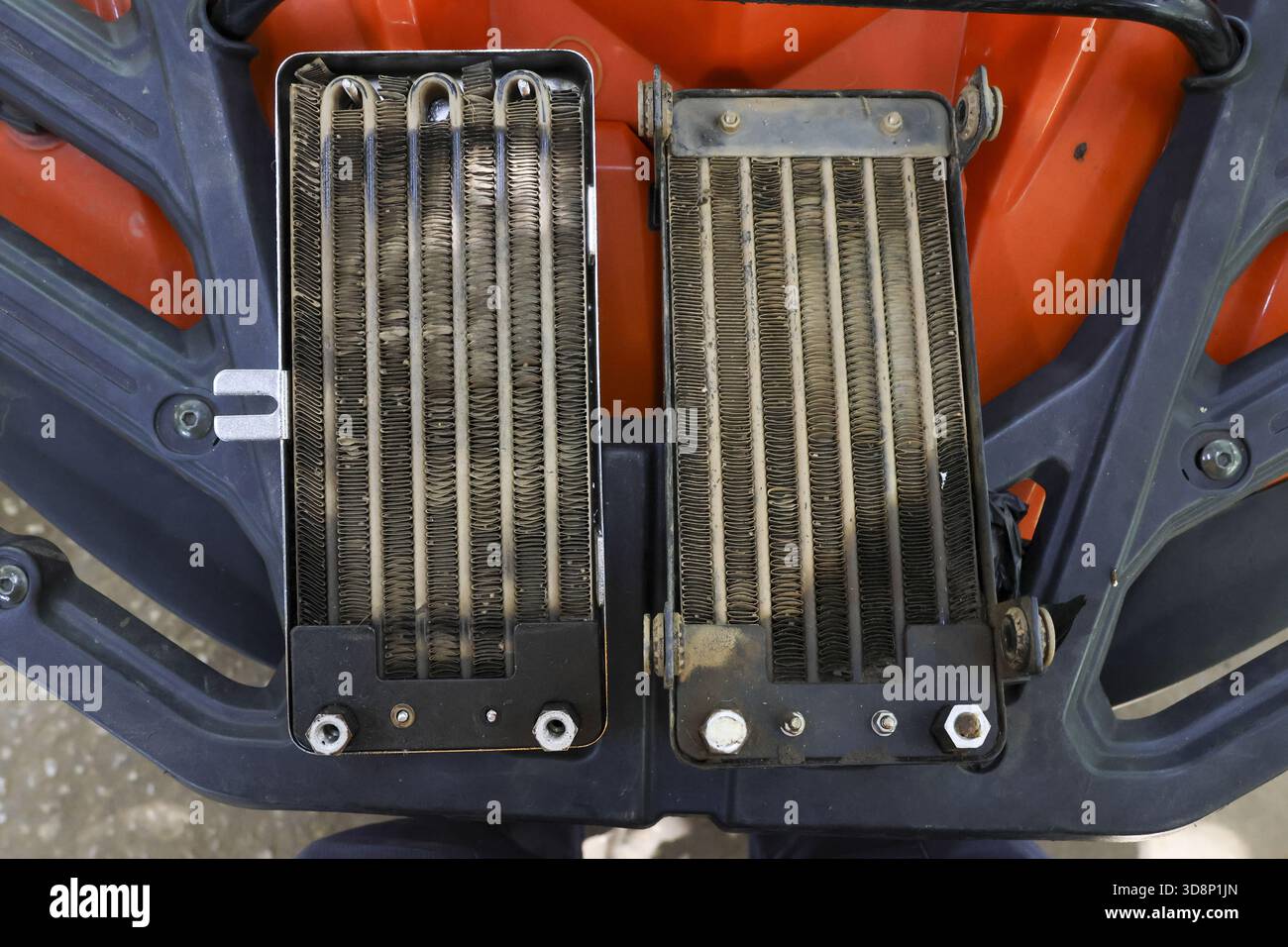 Old and new engine cooling radiator cooler part comparison. side by ...