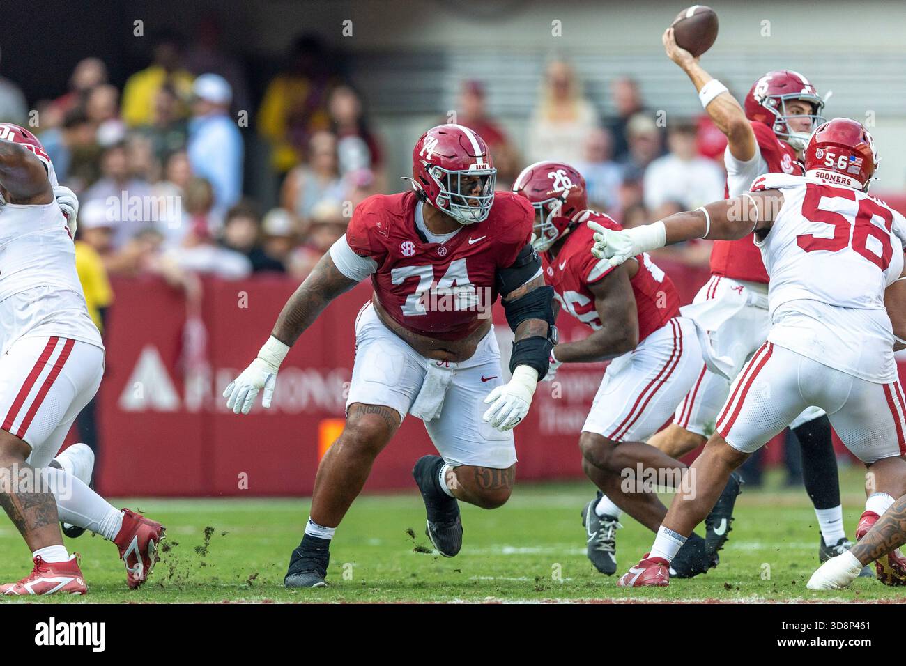 Alabama offensive lineman Kadyn Proctor (74) seeks out a block during ...