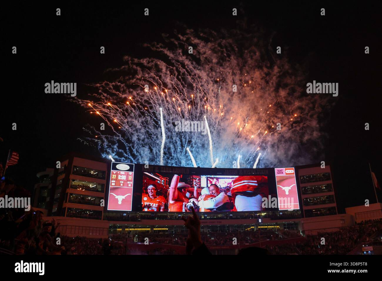 AUSTIN, TX - NOVEMBER 28: Fireworks go off over the big screen as head ...