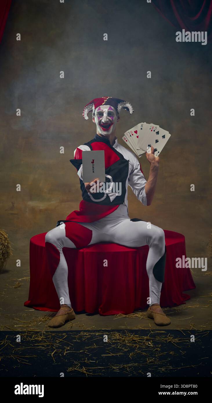 Seated jester hi-res stock photography and images - Alamy