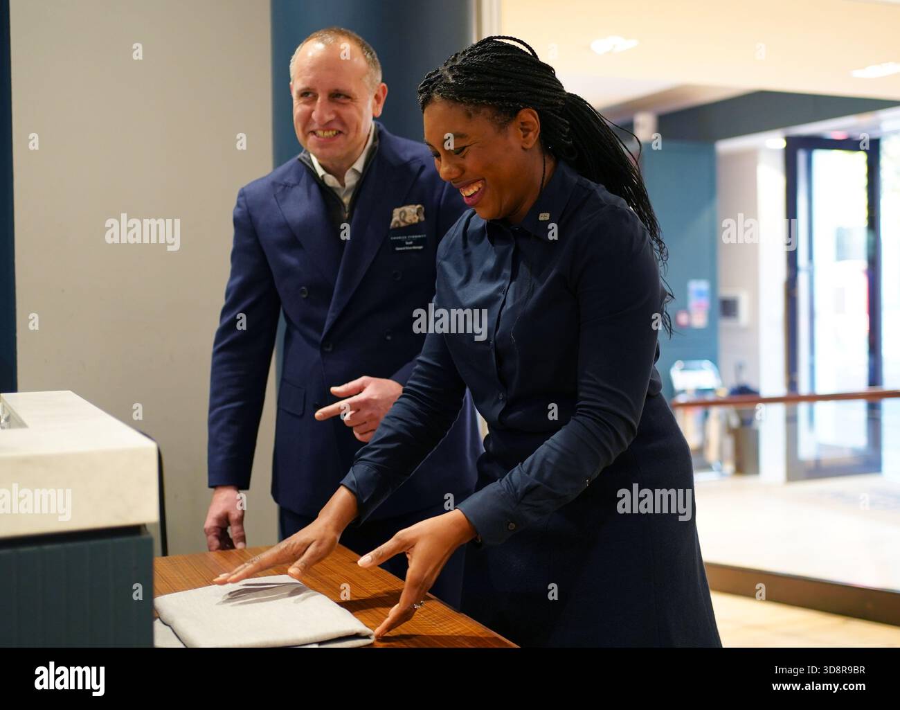 Conservative Party leader Kemi Badenoch with store manager Scott Barry during a visit to Charles Tyrwhitt in central London. Picture date: Tuesday December 2, 2025. Stock Photo