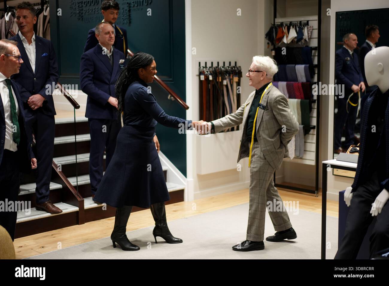 Conservative Party leader Kemi Badenoch with assistant manager Chris Tindall-Robbins during a visit to Charles Tyrwhitt in central London. Picture date: Tuesday December 2, 2025. Stock Photo