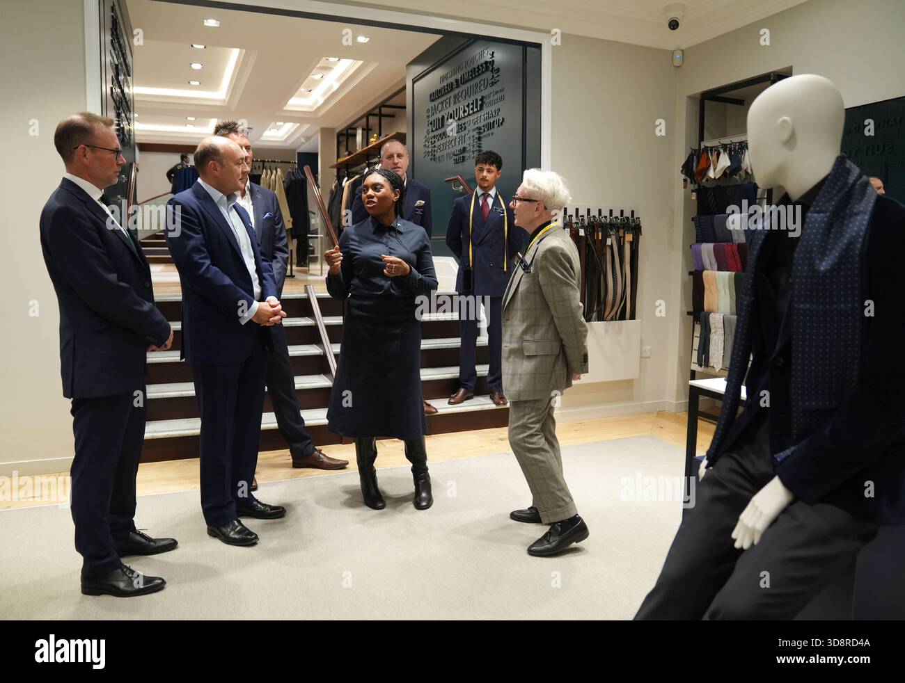(left to right) CEO Luke Kingsnorth, shadow business secretary Andrew Griffith, chief marketing and sales officer Joe Irons, Conservative Party leader Kemi Badenoch, store manager Barry Scott and assistant manager Chris Tindell-Robbins (right) during a visit to the Charles Tyrwhitt store in central London. Picture date: Tuesday December 2, 2025. Stock Photo