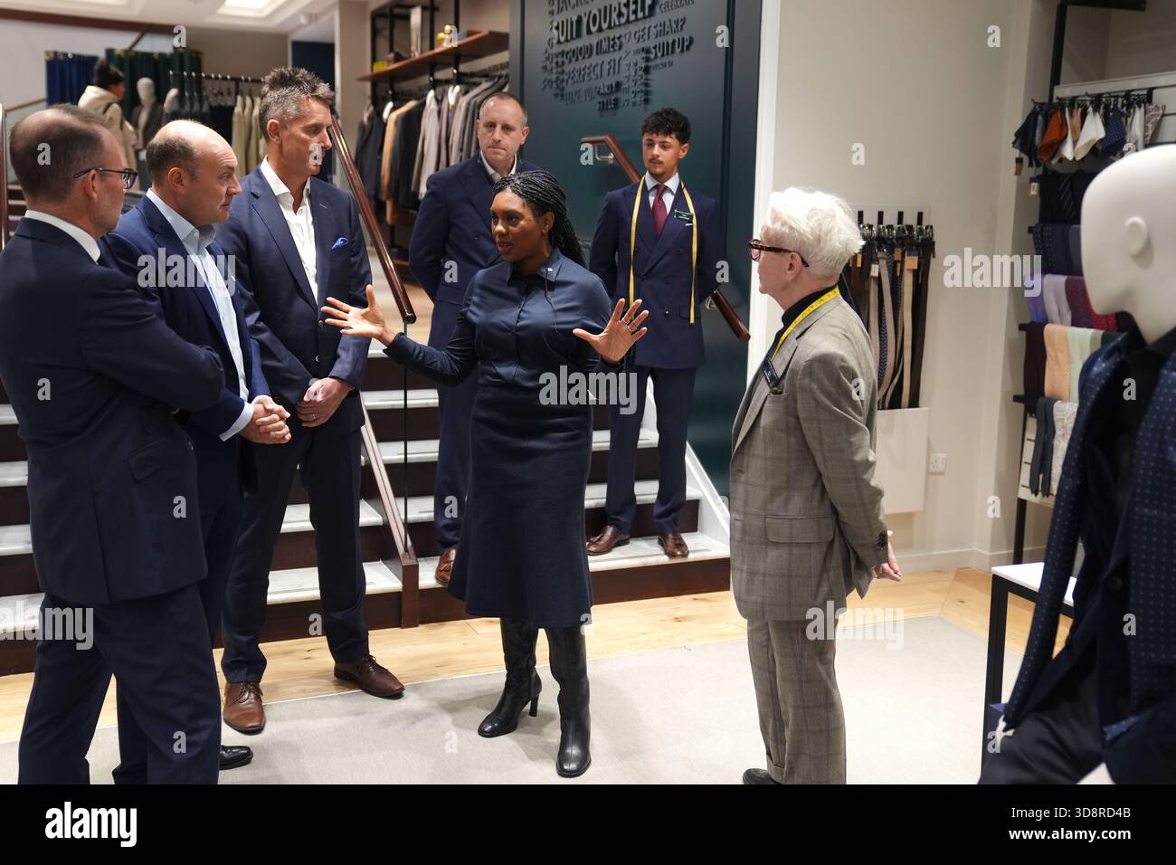 (left to right) CEO Luke Kingsnorth, shadow business secretary Andrew Griffith, chief marketing and sales officer Joe Irons, Conservative Party leader Kemi Badenoch, store manager Barry Scott and assistant manager Chris Tindell-Robbins (right) during a visit to the Charles Tyrwhitt store in central London. Picture date: Tuesday December 2, 2025. Stock Photo