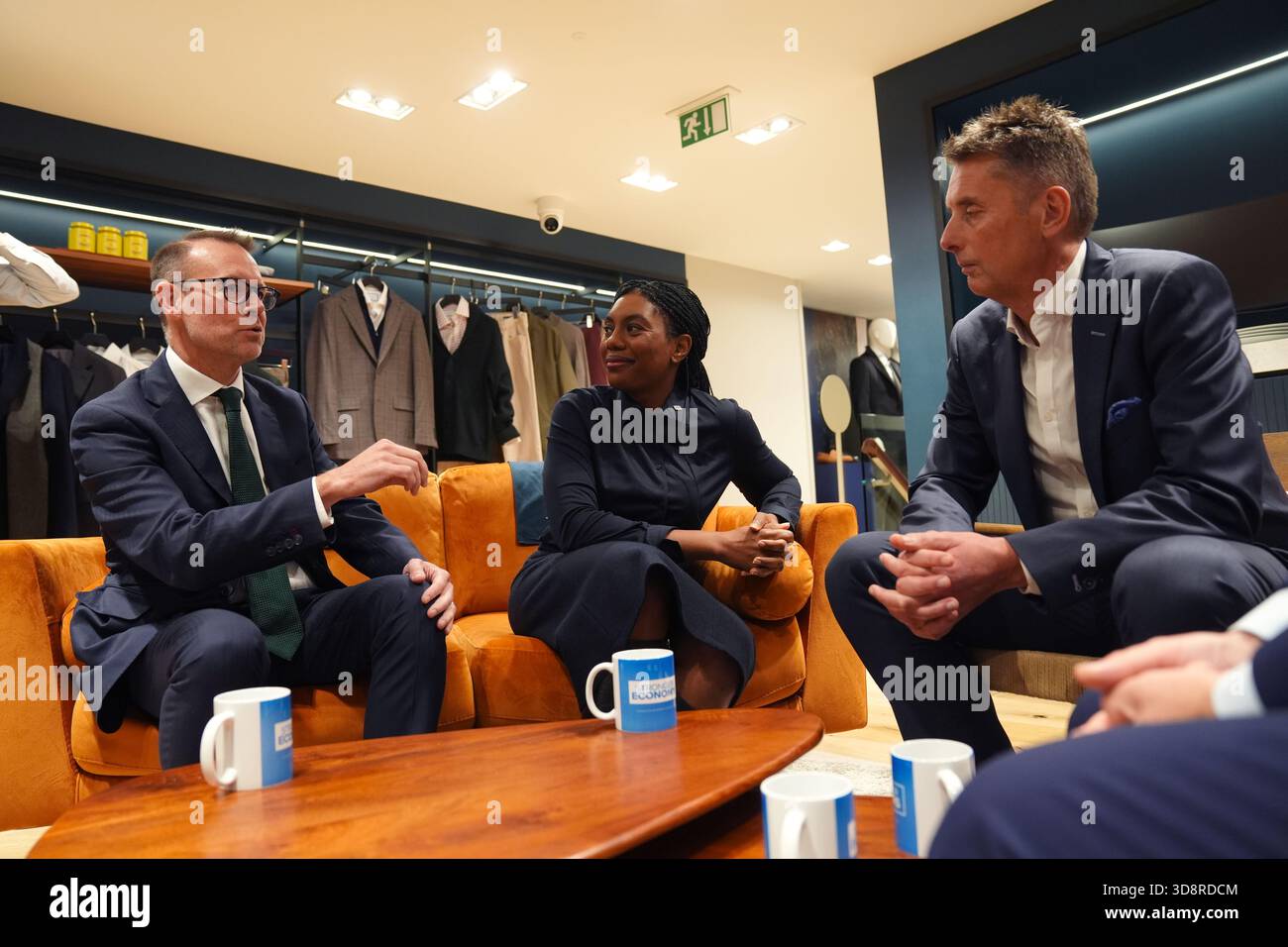 (left to right) CEO Luke Kingsnorth, Conservative Party leader Kemi Badenoch and sales officer Joe Irons during a visit to the Charles Tyrwhitt store in central London. Picture date: Tuesday December 2, 2025. Stock Photo