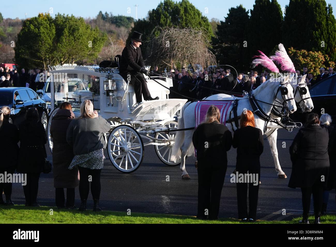The coffin arrives by horse drawn hearse for the funeral of Chloe Hipson at Daldowie Crematorium in Glasgow. 21-year-old Chloe was one of five people killed when their Volkswagen Golf was in a collision with a Toyota Land Cruiser on a road near Dundalk on November 15. Picture date: Tuesday December 2, 2025. Stock Photo