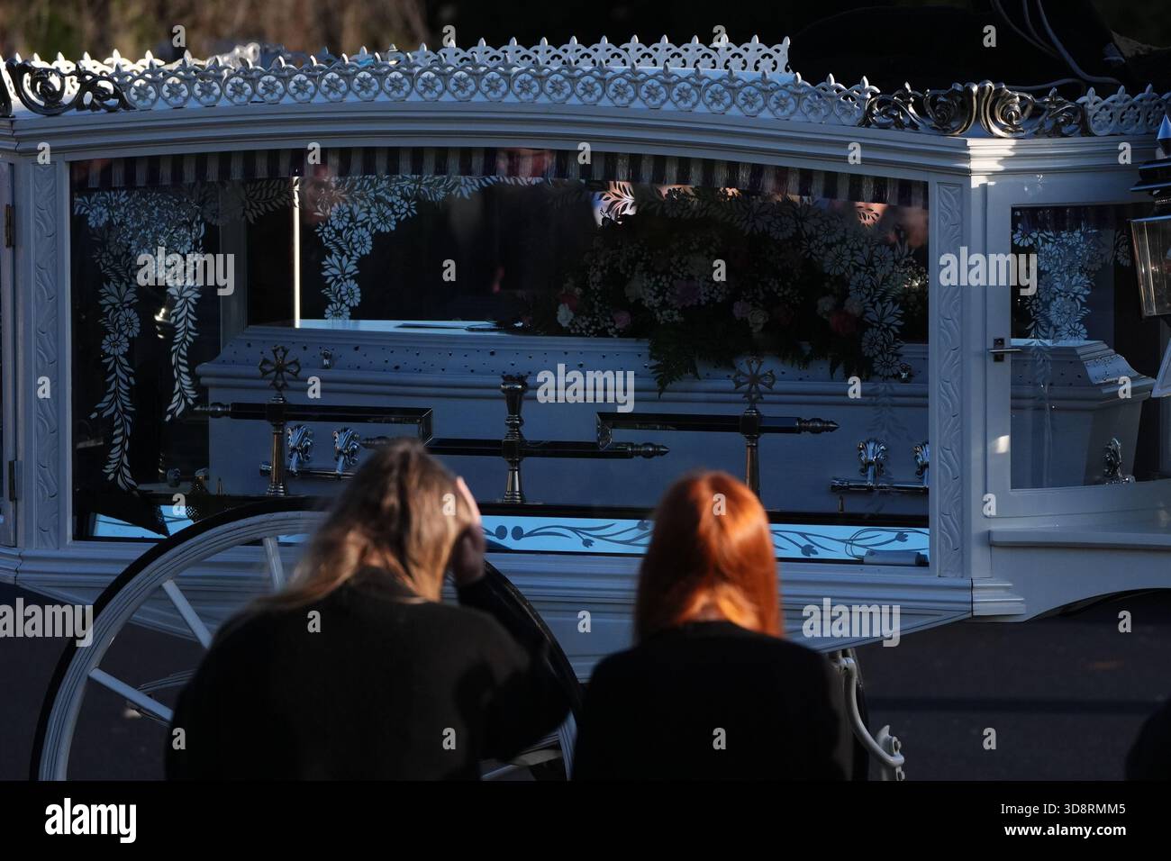 The coffin arrives by horse drawn hearse for the funeral of Chloe Hipson at Daldowie Crematorium in Glasgow. 21-year-old Chloe was one of five people killed when their Volkswagen Golf was in a collision with a Toyota Land Cruiser on a road near Dundalk on November 15. Picture date: Tuesday December 2, 2025. Stock Photo
