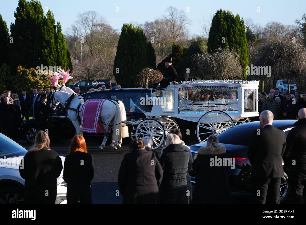 The coffin arrives by horse drawn hearse for the funeral of Chloe Hipson at Daldowie Crematorium in Glasgow. 21-year-old Chloe was one of five people killed when their Volkswagen Golf was in a collision with a Toyota Land Cruiser on a road near Dundalk on November 15. Picture date: Tuesday December 2, 2025. Stock Photo