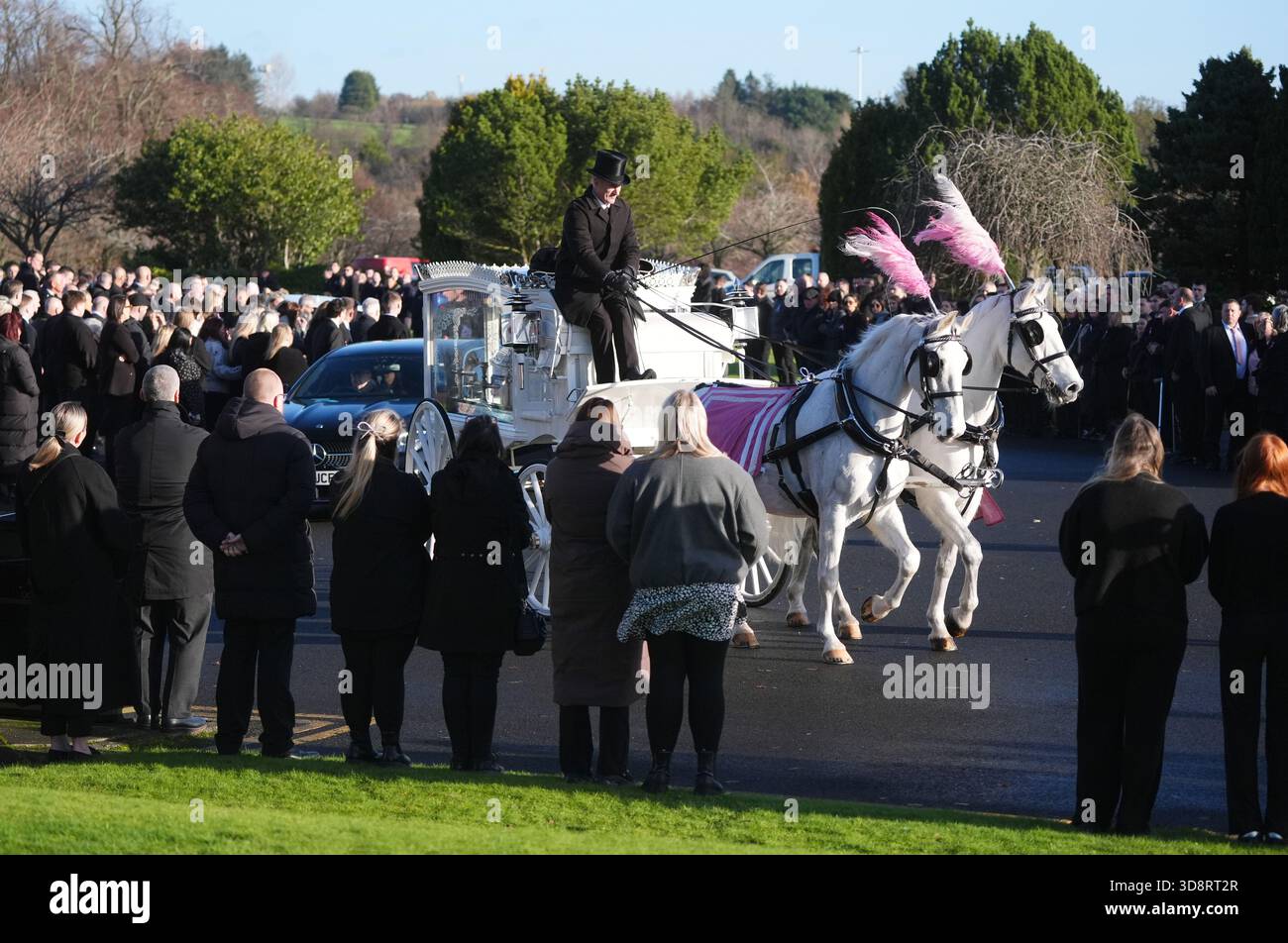The coffin arrives by horse drawn hearse for the funeral of Chloe Hipson at Daldowie Crematorium in Glasgow. 21-year-old Chloe was one of five people killed when their Volkswagen Golf was in a collision with a Toyota Land Cruiser on a road near Dundalk on November 15. Picture date: Tuesday December 2, 2025. Stock Photo