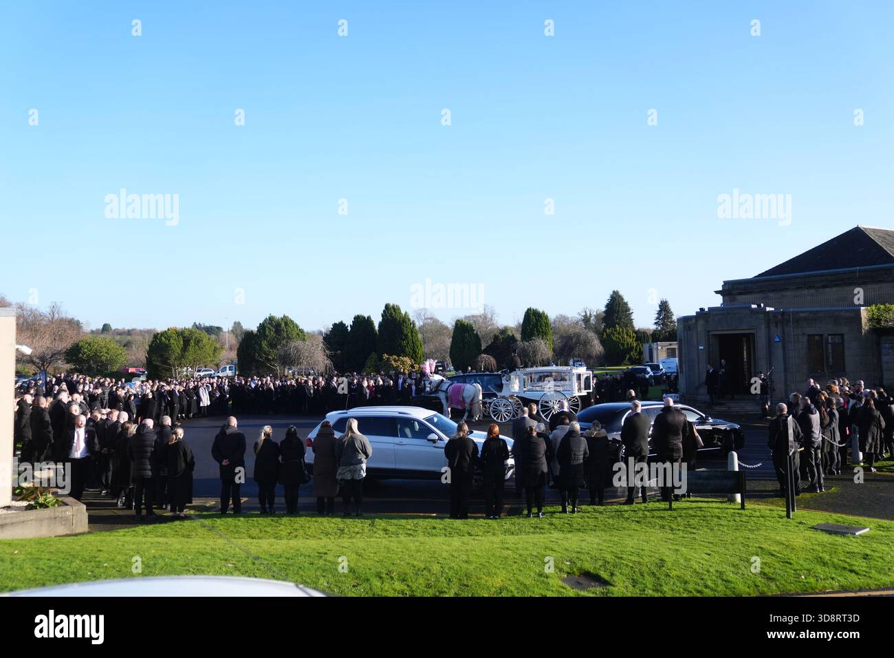 The coffin arrives by horse drawn hearse for the funeral of Chloe Hipson at Daldowie Crematorium in Glasgow. 21-year-old Chloe was one of five people killed when their Volkswagen Golf was in a collision with a Toyota Land Cruiser on a road near Dundalk on November 15. Picture date: Tuesday December 2, 2025. Stock Photo