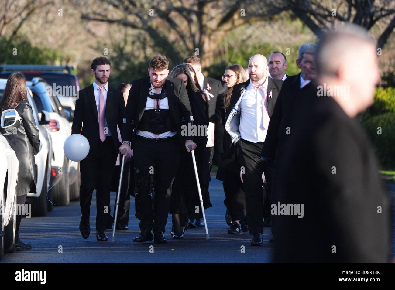 Mourners arriving the funeral of Chloe Hipson at Daldowie Crematorium in Glasgow. 21-year-old Chloe was one of five people killed when their Volkswagen Golf was in a collision with a Toyota Land Cruiser on a road near Dundalk on November 15. Picture date: Tuesday December 2, 2025. Stock Photo