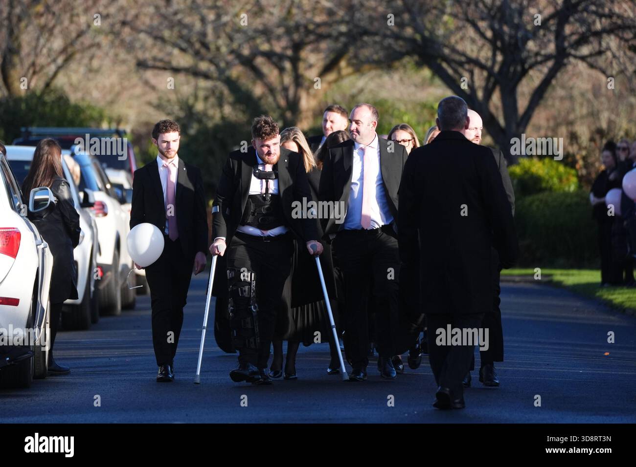 Mourners arriving the funeral of Chloe Hipson at Daldowie Crematorium in Glasgow. 21-year-old Chloe was one of five people killed when their Volkswagen Golf was in a collision with a Toyota Land Cruiser on a road near Dundalk on November 15. Picture date: Tuesday December 2, 2025. Stock Photo