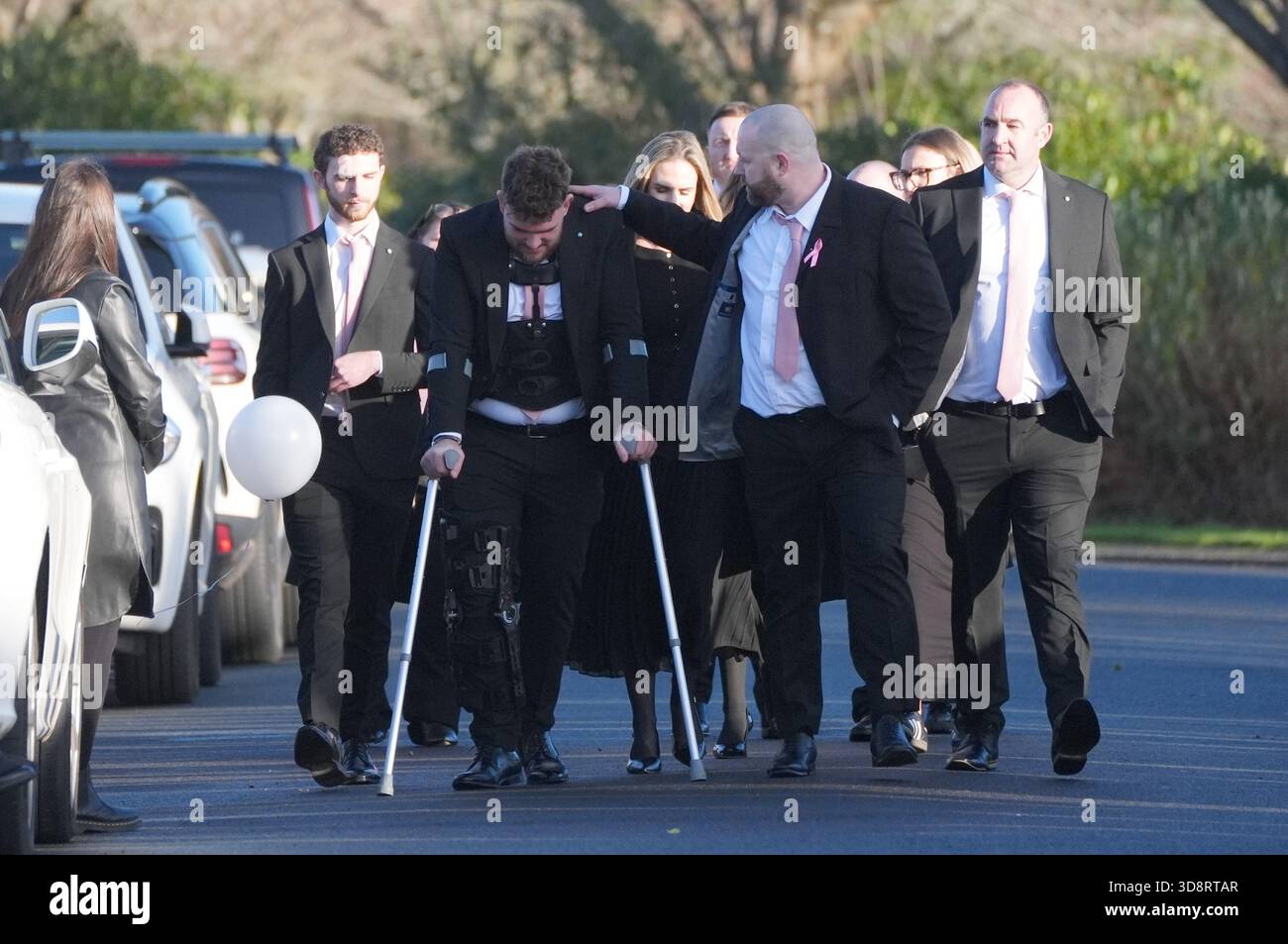 Mourners arriving the funeral of Chloe Hipson at Daldowie Crematorium in Glasgow. 21-year-old Chloe was one of five people killed when their Volkswagen Golf was in a collision with a Toyota Land Cruiser on a road near Dundalk on November 15. Picture date: Tuesday December 2, 2025. Stock Photo