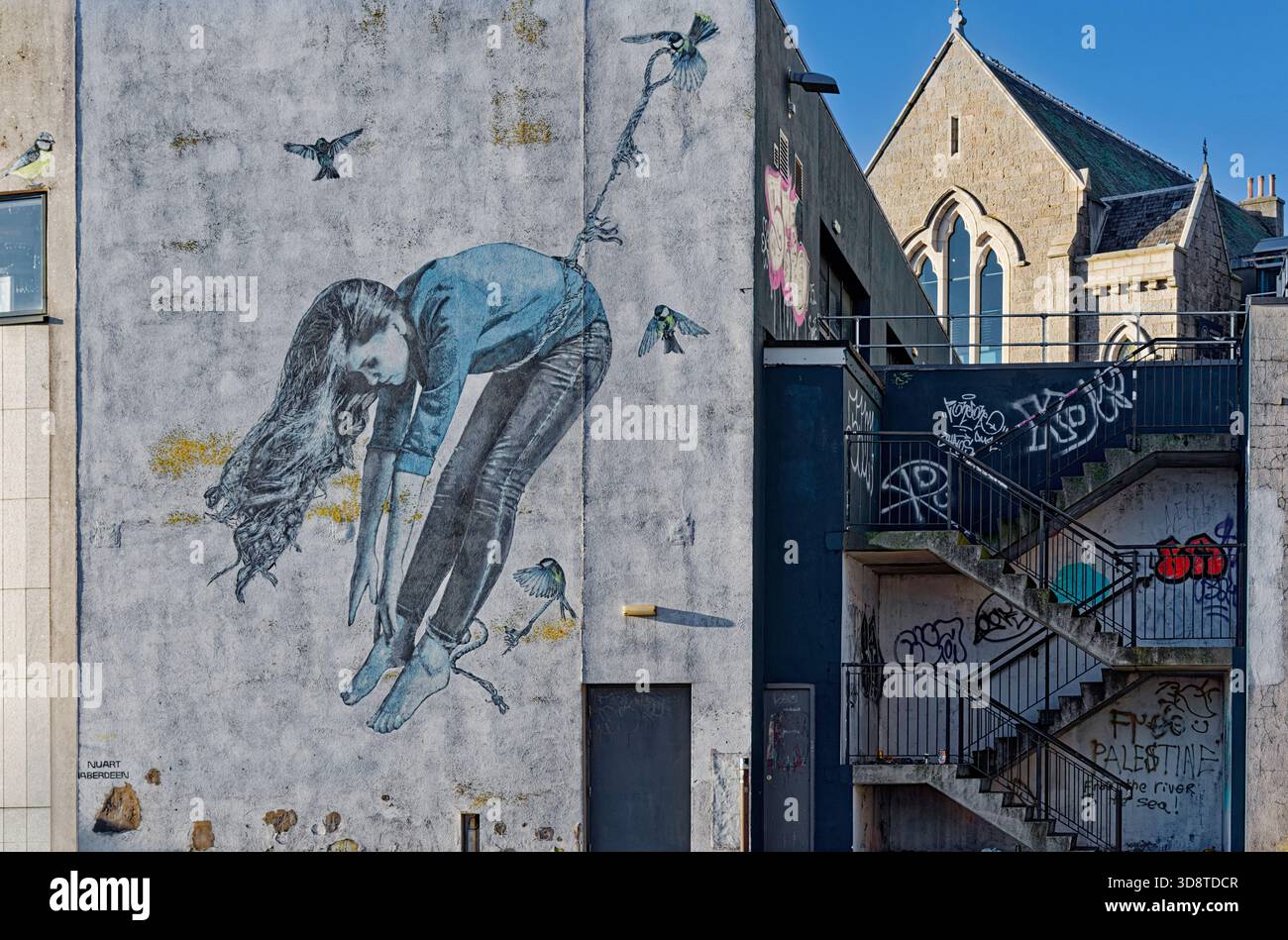 Aberdeen Scotland large mural in Virginia Street girl and birds Stock Photo