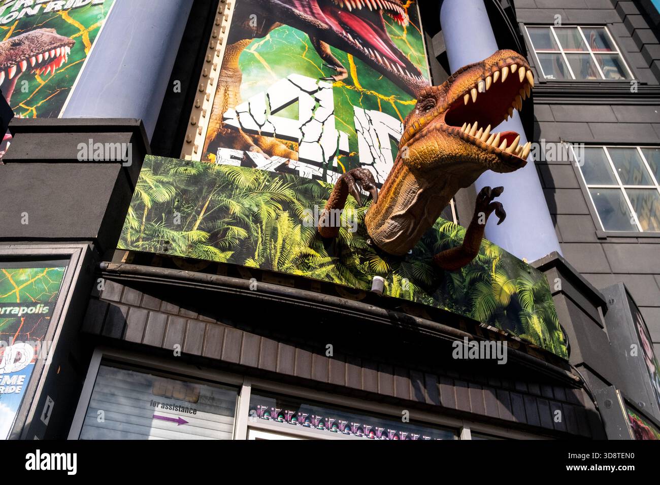 Close view of the dinosaur themed facade of a 4D Extreme Motion Ride ...