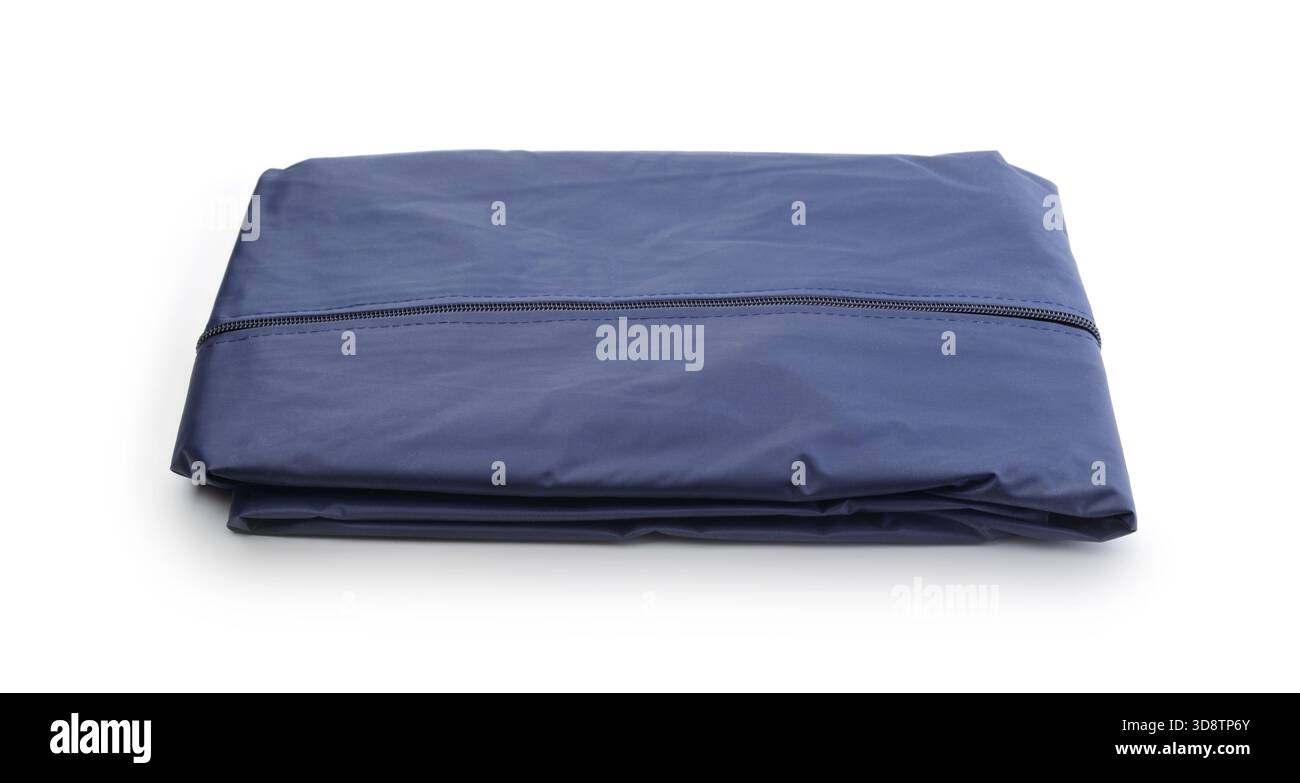 New blue folded nylon  raincoat isolated on white. Stock Photo