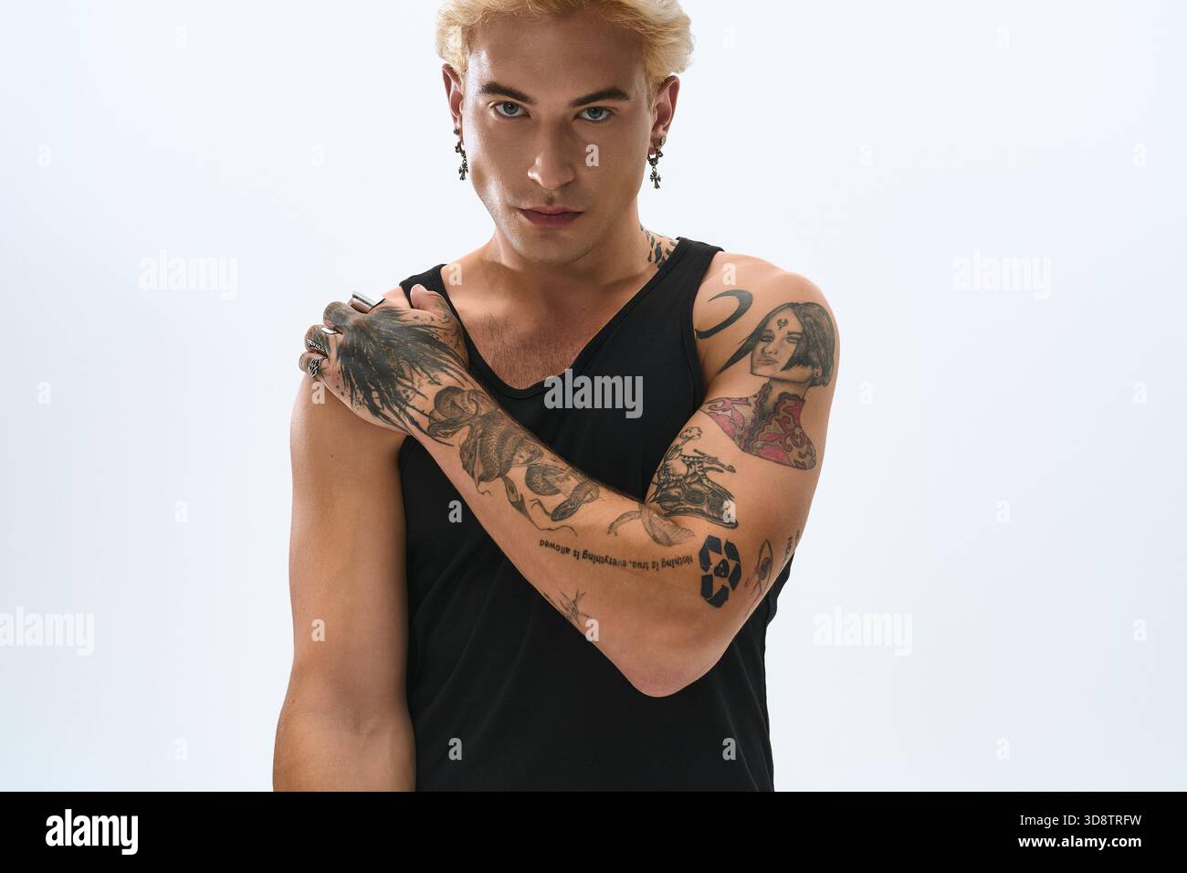 Arms with tattoos hi-res stock photography and images - Page 12 - Alamy, image size:1300x956