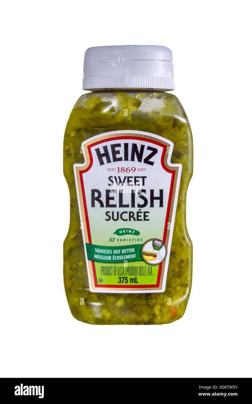 A plastic squeezy bottle of Heinz Sweet Relish, produceed for the Canadian market.  With a bilingual label. Stock Photo