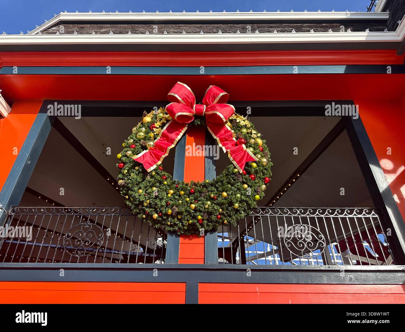 Christmas Wreath on Red Building at Santa Cruz Boardwalk - Smartphone Captured Stock Image