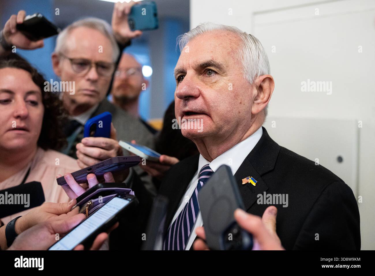 UNITED STATES - DECEMBER 2: Sen. Jack Reed, D-R.I., speaks with ...