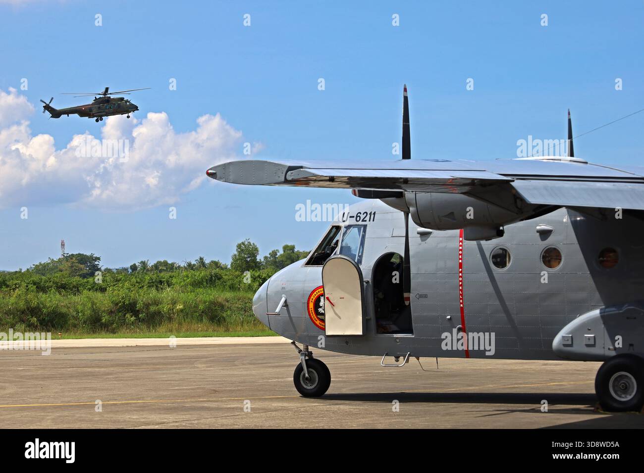 Aceh Besar, Aceh, Indonesia. 2nd Dec, 2025. An Aceh flood relief helicopter prepares to land at Sultan Iskandar Muda airport, Aceh province, Indonesia on Monday, December 02, 2025. Various types of military and commercial aircraft, traffic at Sultan Iskandar Muda Airport, Aceh province, to support the distribution of aid to victims of the aceh flood disaster has been isolated since November 26, 2025. (Credit Image: © Khairu Syukrillah/ZUMA Press Wire) EDITORIAL USAGE ONLY! Not for Commercial USAGE! Stock Photo
