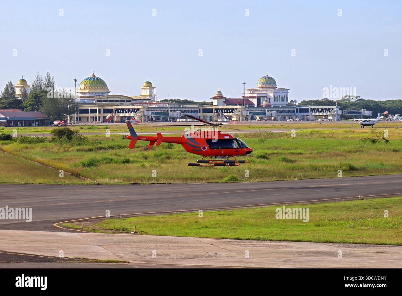 Aceh Besar, Aceh, Indonesia. 2nd Dec, 2025. An Aceh flood relief helicopter prepares to land at Sultan Iskandar Muda airport, Aceh province, Indonesia on Monday, December 02, 2025. Various types of military and commercial aircraft, traffic at Sultan Iskandar Muda Airport, Aceh province, to support the distribution of aid to victims of the aceh flood disaster has been isolated since November 26, 2025. (Credit Image: © Khairu Syukrillah/ZUMA Press Wire) EDITORIAL USAGE ONLY! Not for Commercial USAGE! Stock Photo