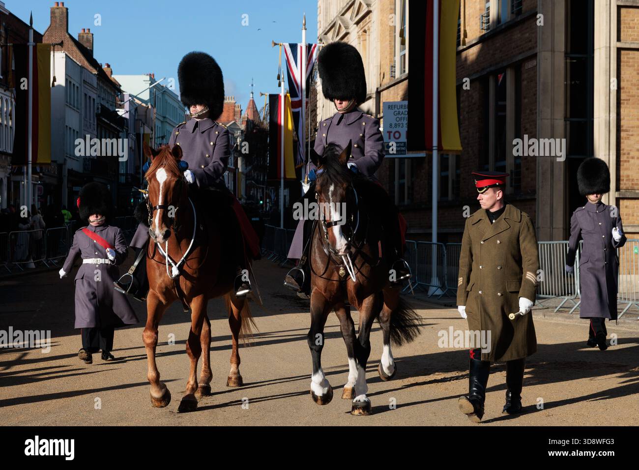 Windsor, UK. 2nd December, 2025. Military personnel pass along the High Street during a rehearsal for a carriage ride as part of a state visit by the German President Frank-Walter Steinmeier. King Charles III will host Mr Steinmeier and his wife Elke BŸdenbender at Windsor Castle from 3rd-5th December. Credit: Mark Kerrison/Alamy Live News Stock Photo