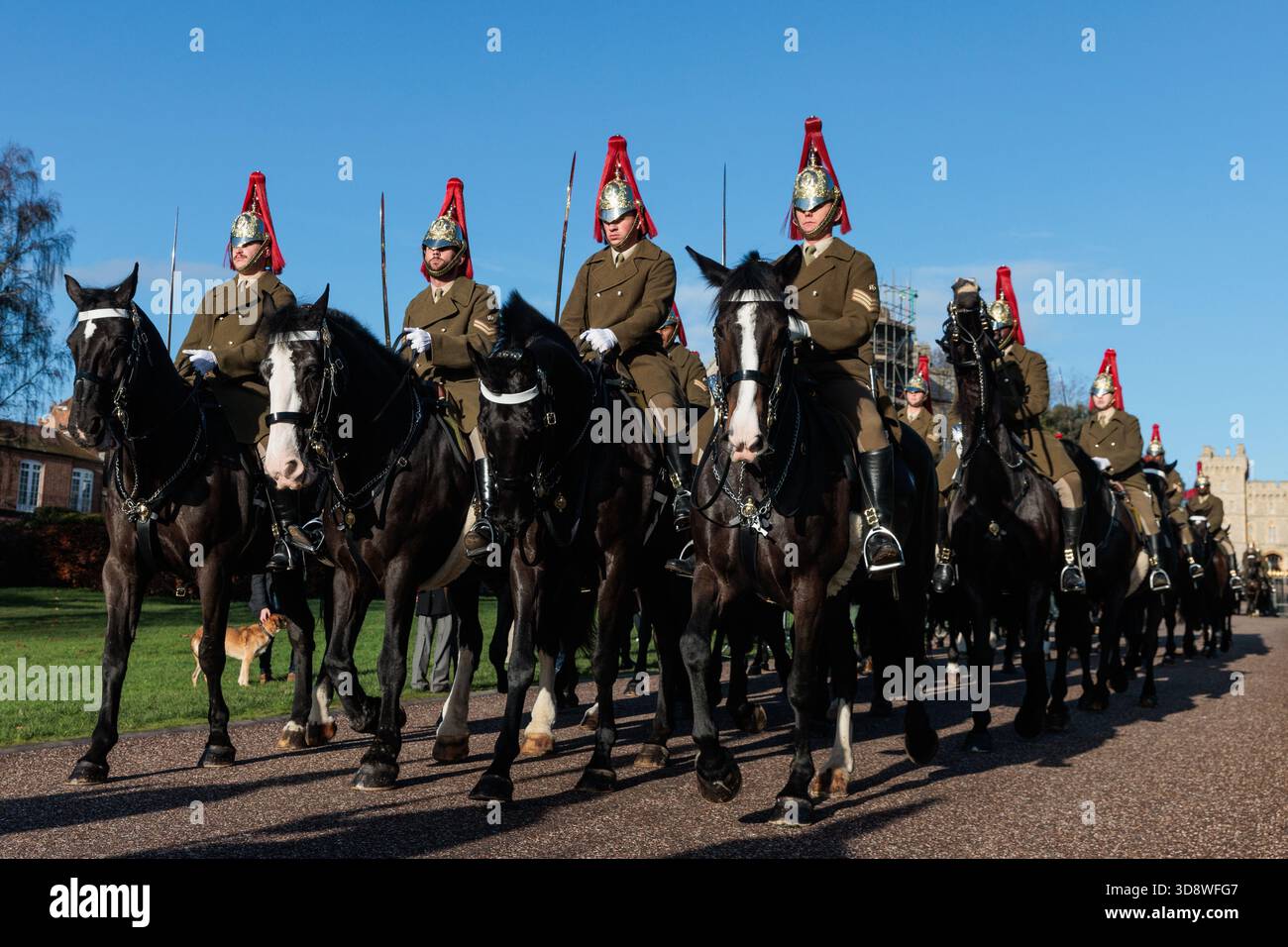 Windsor, UK. 2nd December, 2025. Mounted guards pass along the Long Walk in front of Windsor Castle during a rehearsal for a carriage ride as part of a state visit by the German President Frank-Walter Steinmeier. King Charles III will host Mr Steinmeier and his wife Elke BŸdenbender at Windsor Castle from 3rd-5th December. Credit: Mark Kerrison/Alamy Live News Stock Photo