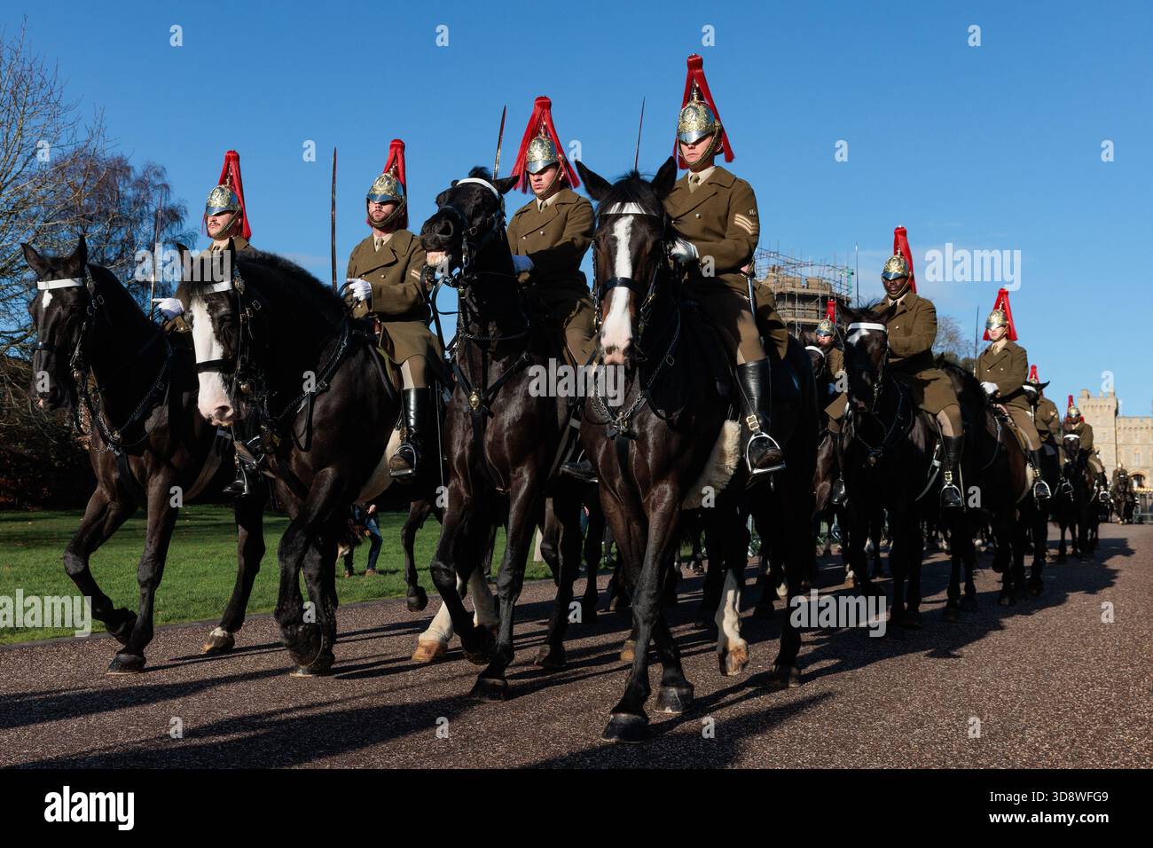 Windsor, UK. 2nd December, 2025. Mounted guards pass along the Long Walk in front of Windsor Castle during a rehearsal for a carriage ride as part of a state visit by the German President Frank-Walter Steinmeier. King Charles III will host Mr Steinmeier and his wife Elke BŸdenbender at Windsor Castle from 3rd-5th December. Credit: Mark Kerrison/Alamy Live News Stock Photo